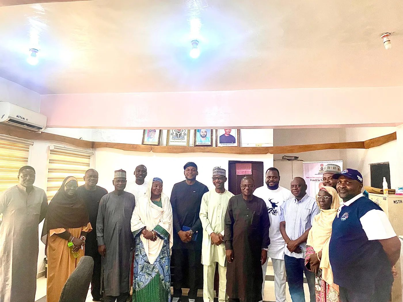 Group portrait of Tobey with public-health and government stakeholders
